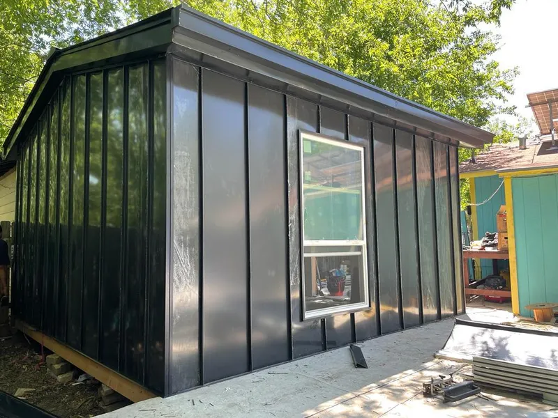 Black standing seam metal wall panels for Metal Roof Installation in East Marlborough